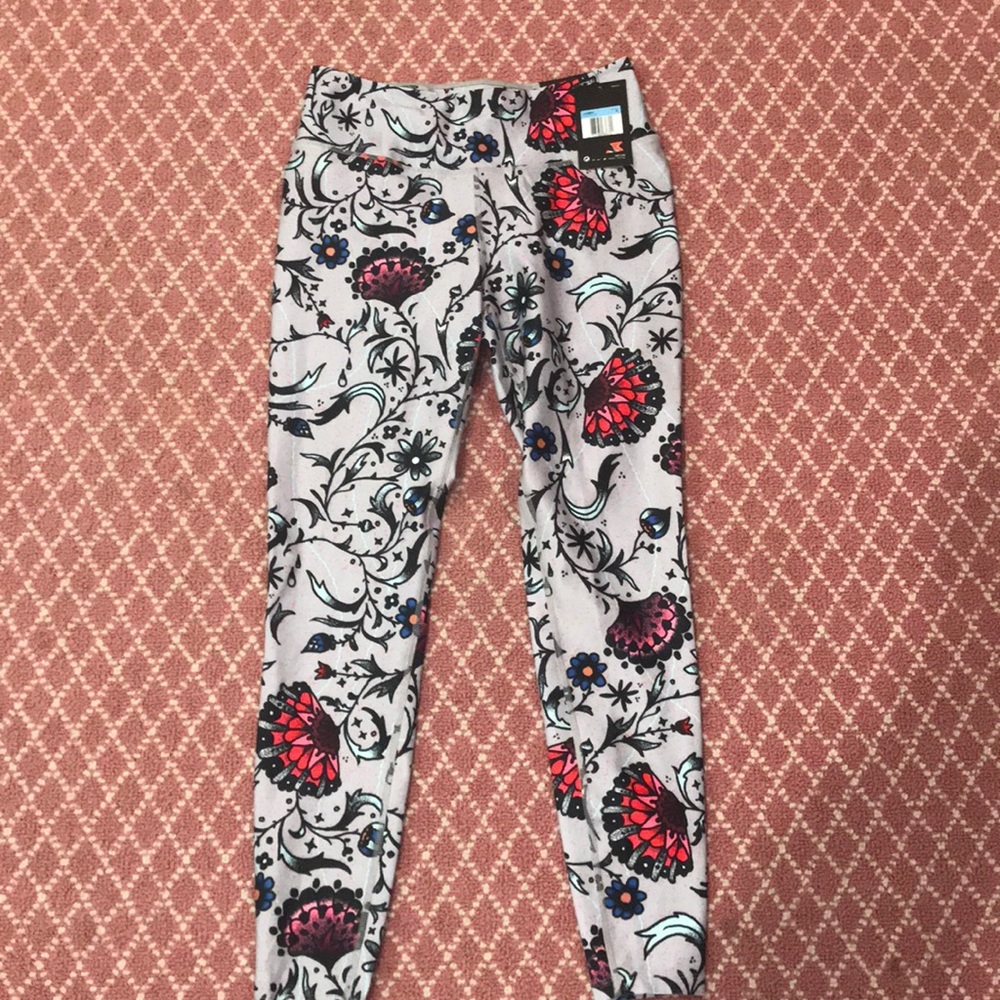 Nike floral “legend tight” leggings